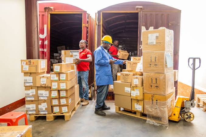 Jumla Uganda's humanitarian equipment warehouse in Kampala – rows of palletised emergency shelter kits, WASH supplies, and medical boxes ready for dispatch to disaster zones and refugee settlements across Uganda.