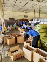 Jumla Uganda warehouse stocked with pallets of relief items including medical supplies, shelter kits, and food aid ready for distribution across Uganda.